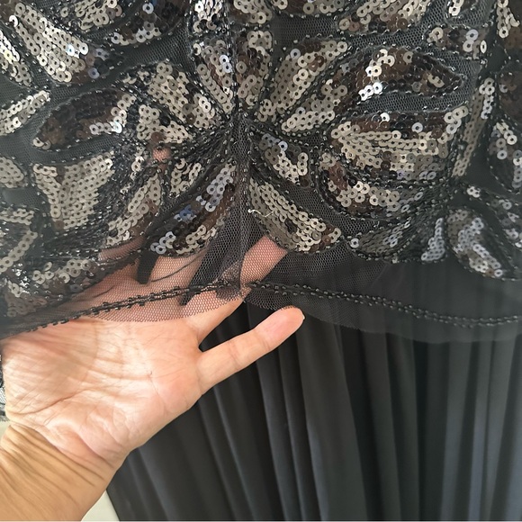 Maxi black period style sequined sleeveless gown with flowy material. - Picture 10 of 13